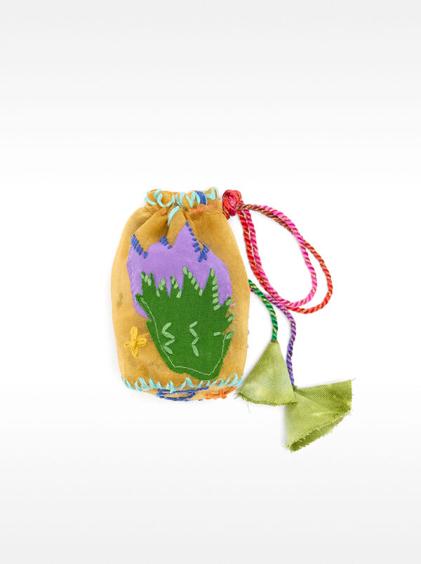 Necklace with pierced pendant cord