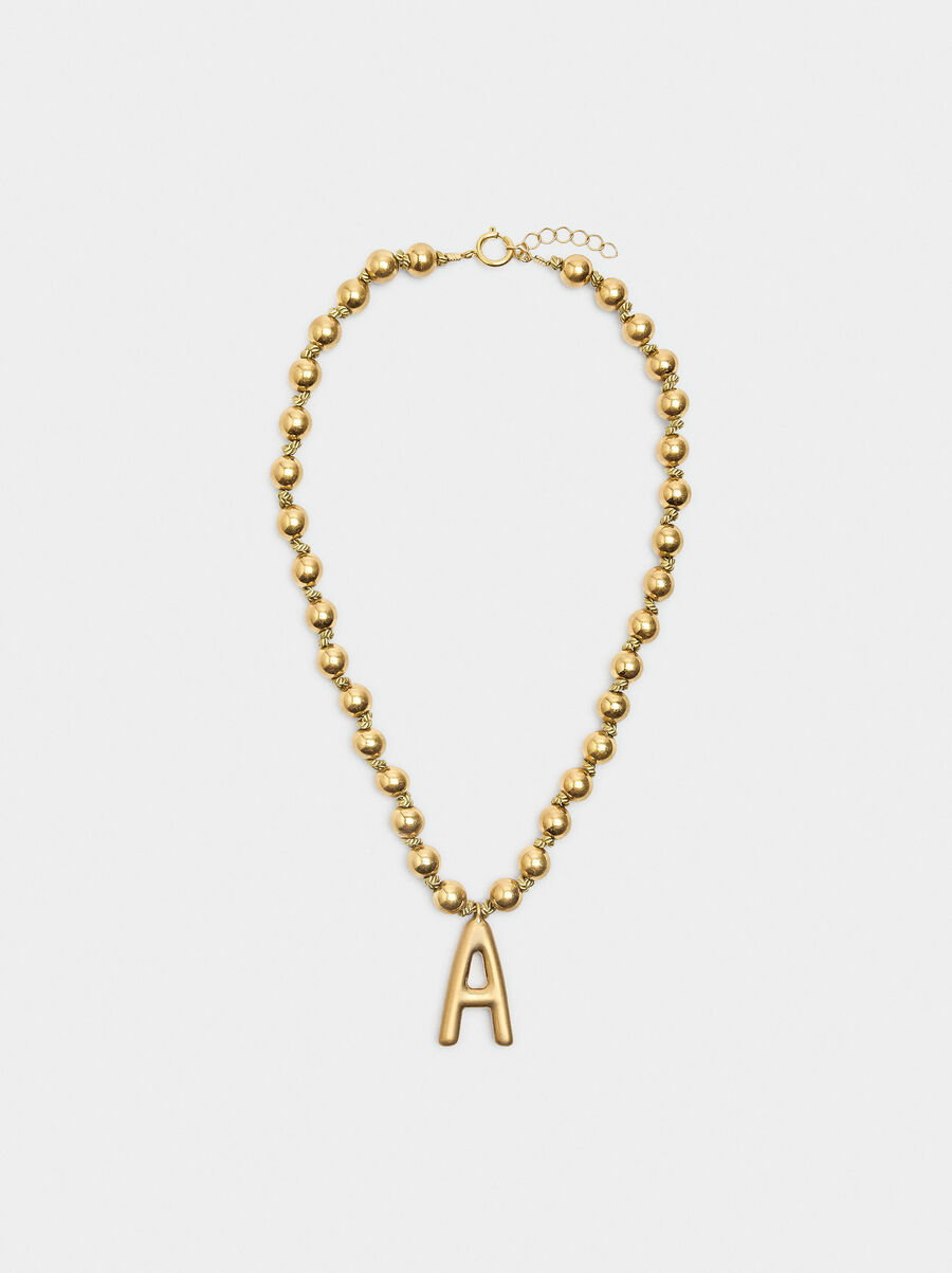 Short necklace with gold beads