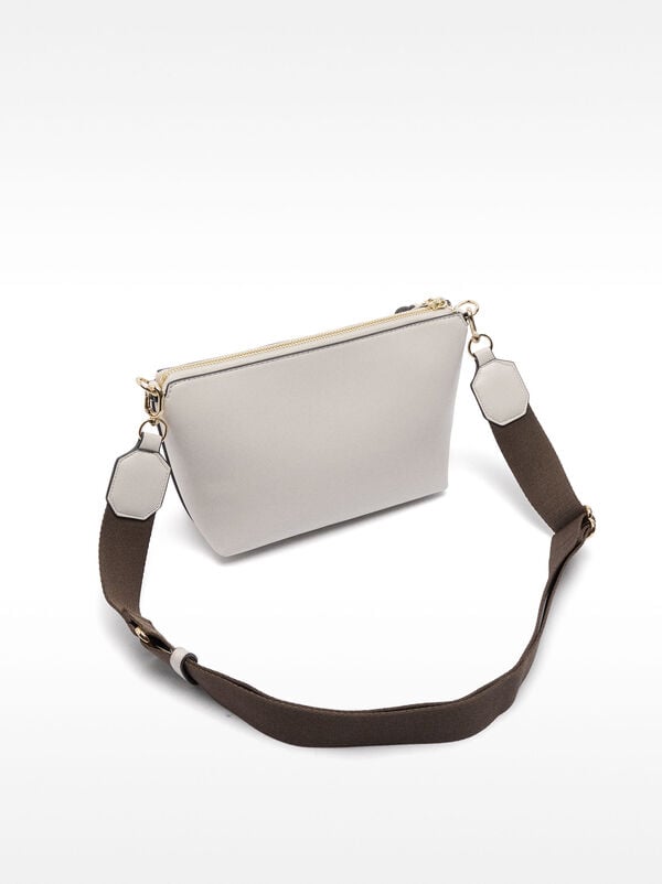 Perforated crossbody bag