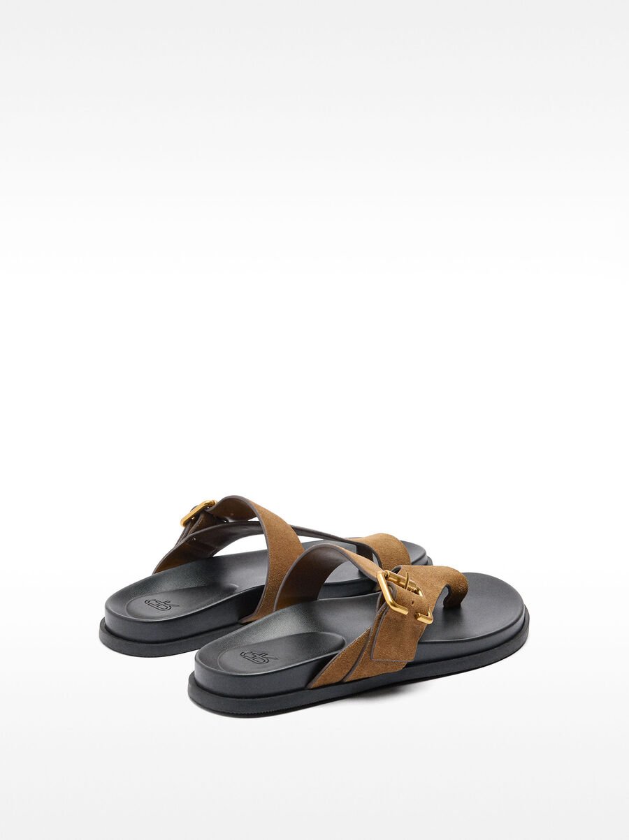 Leather sandals with straps and buckle