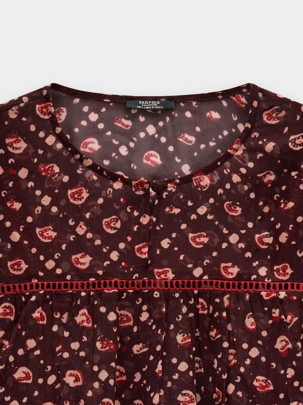 Blouse with semi-transparent print