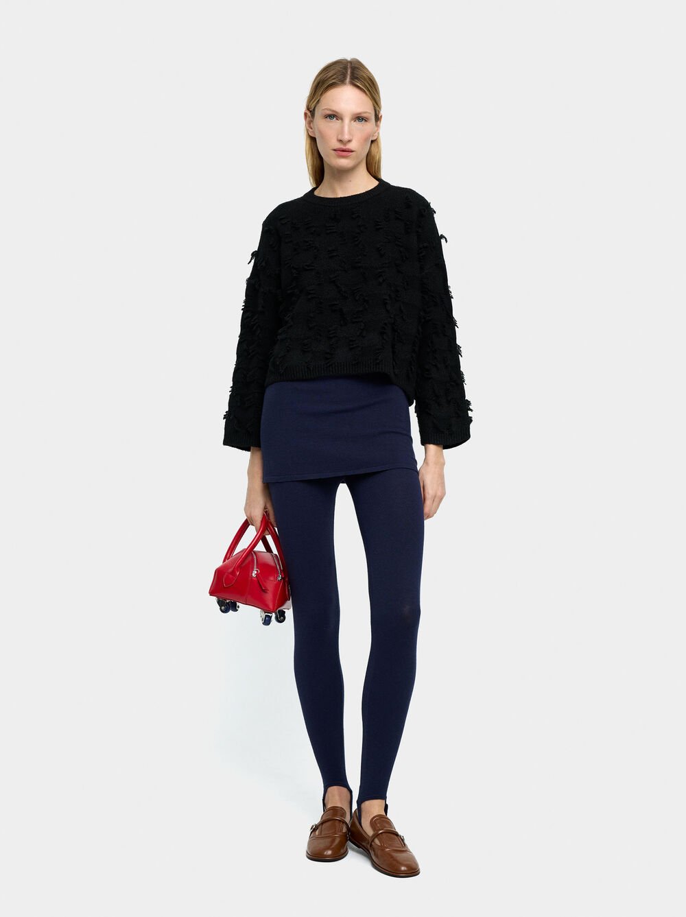 Knitted jumper with fringes
