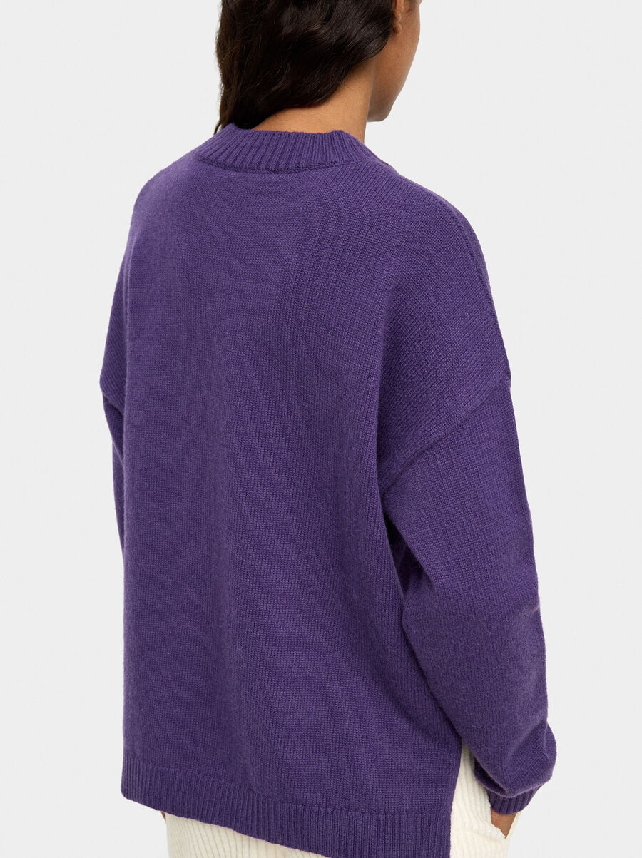 Jersey de punto con bolsillo efecto piel