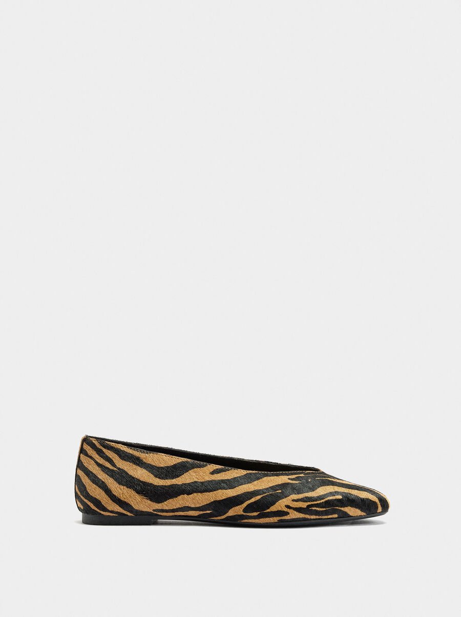 Animal print leather ballet flats
