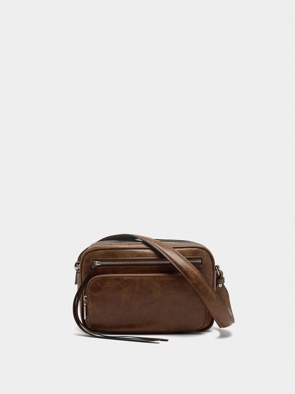 Crossbody bag with aged effect