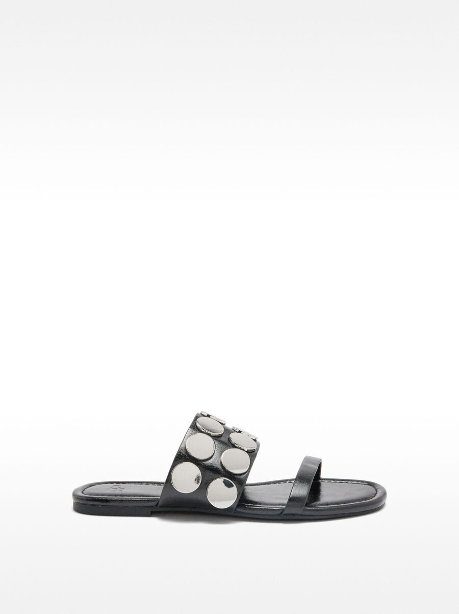 Flat sandals with metallic details