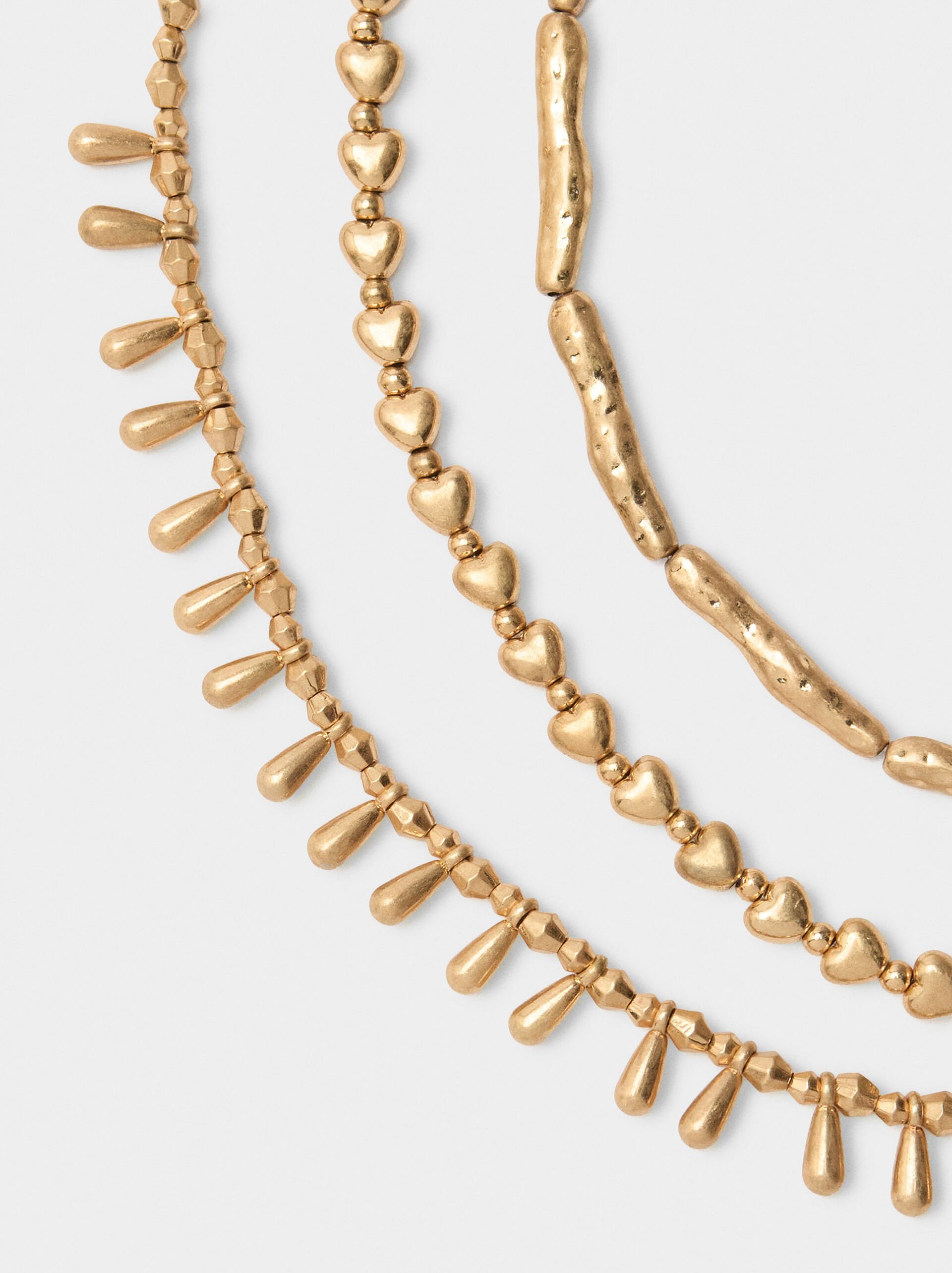 Set of short golden necklaces image number 1.0