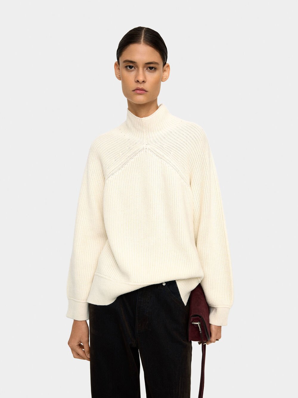 Knit sweater with high neck