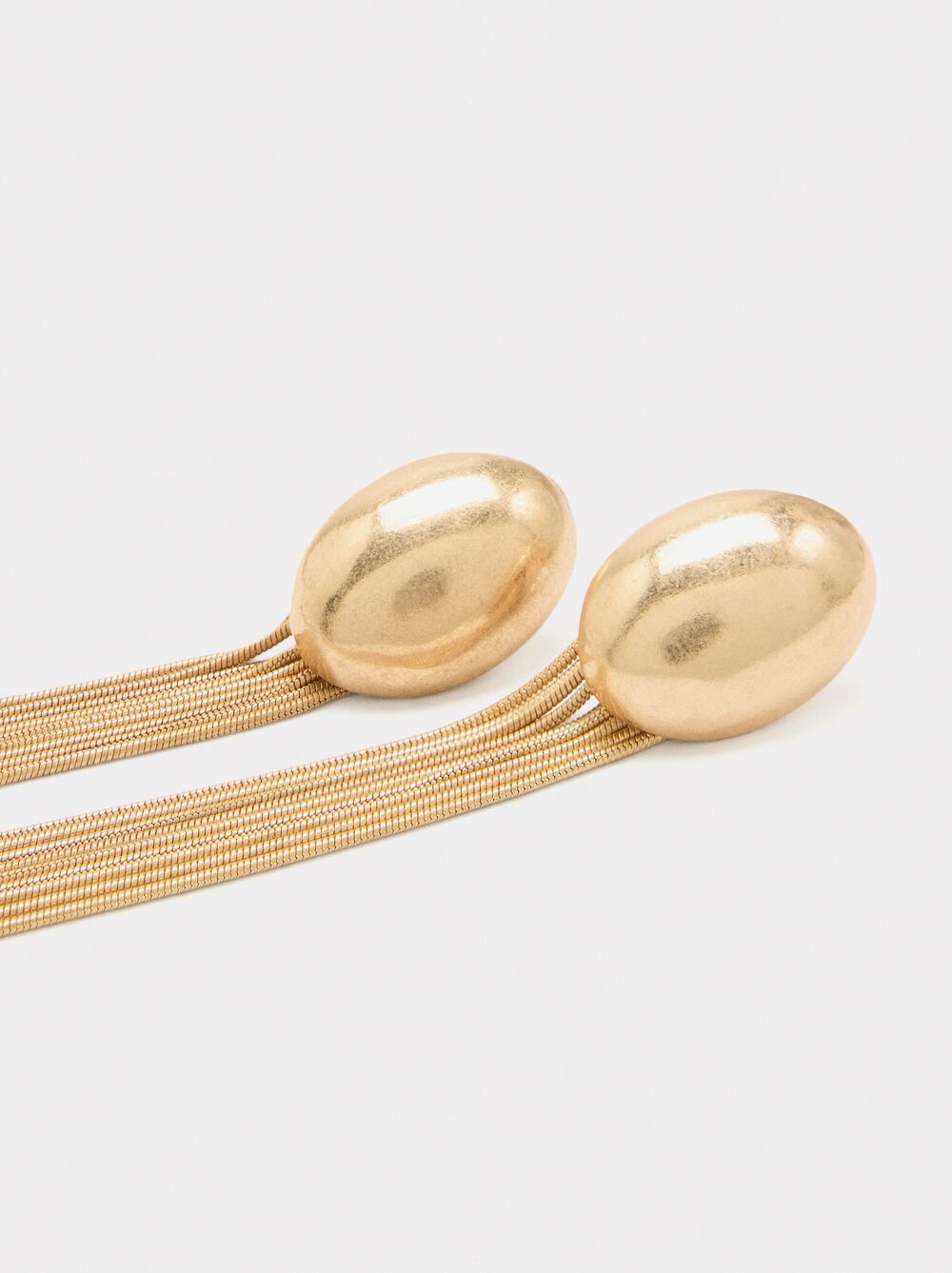 Boucles d'oreilles longues avec franges métalliques