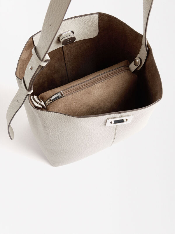 Shoulder bag with removable bag