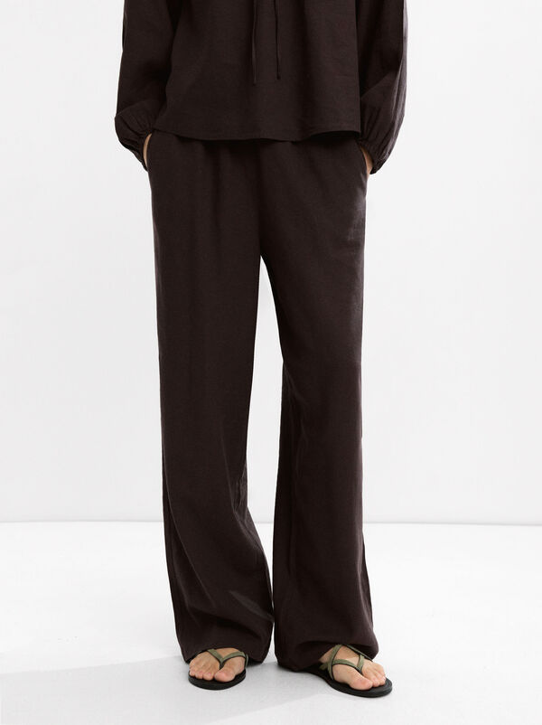 Trousers with linen elastic waistband