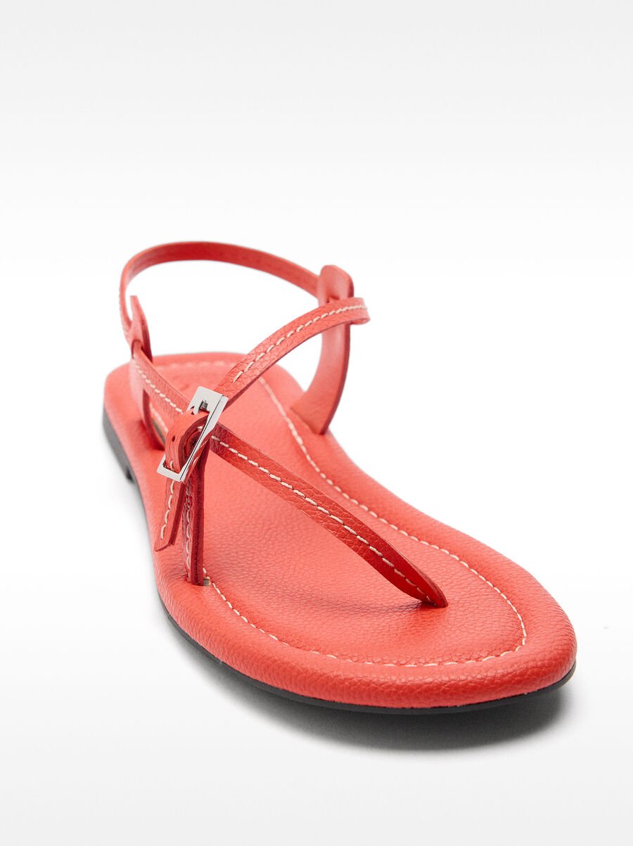 Flat leather sandals with thin straps