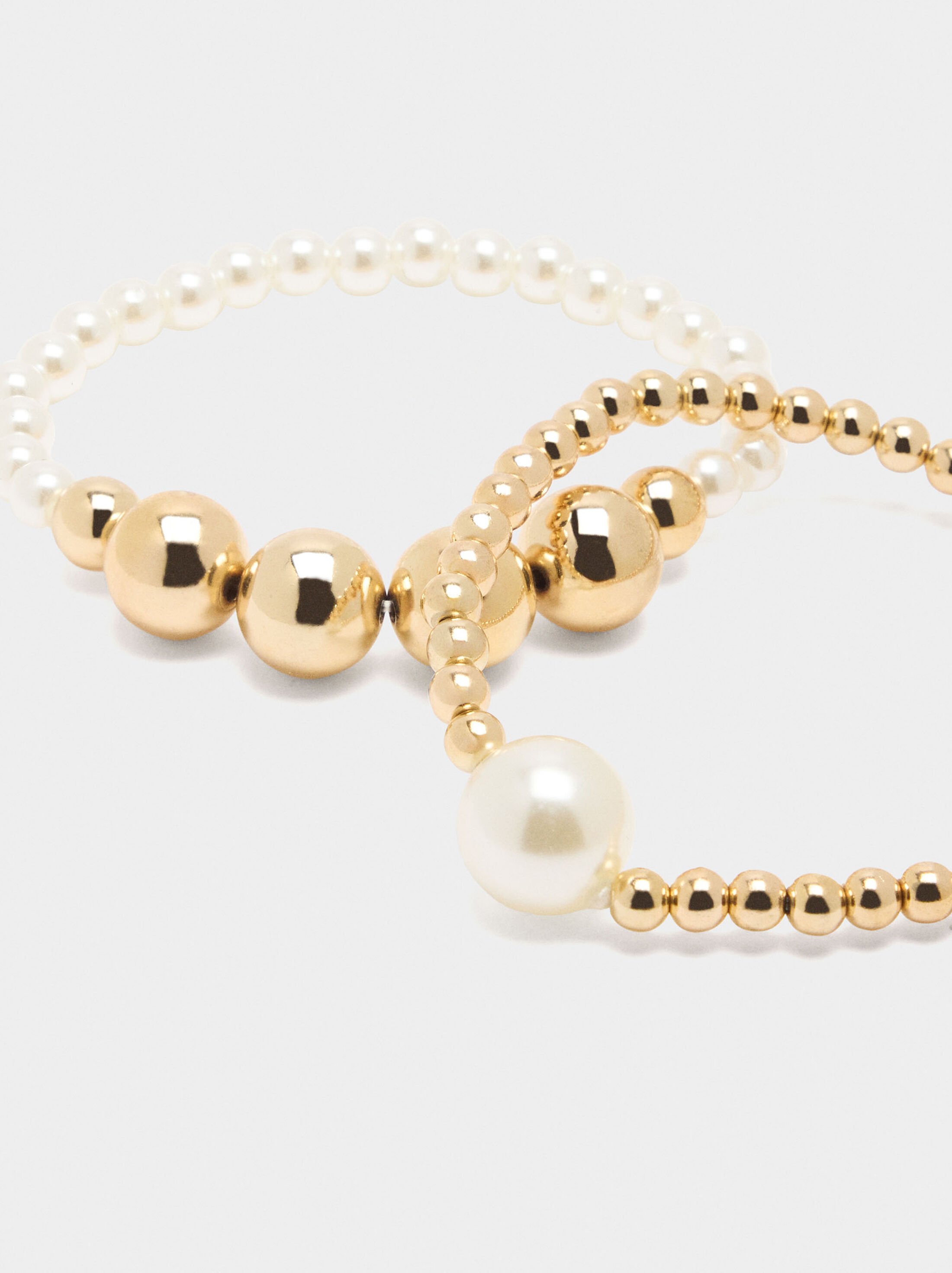 Set of elastic bracelets with pearls image number 1.0