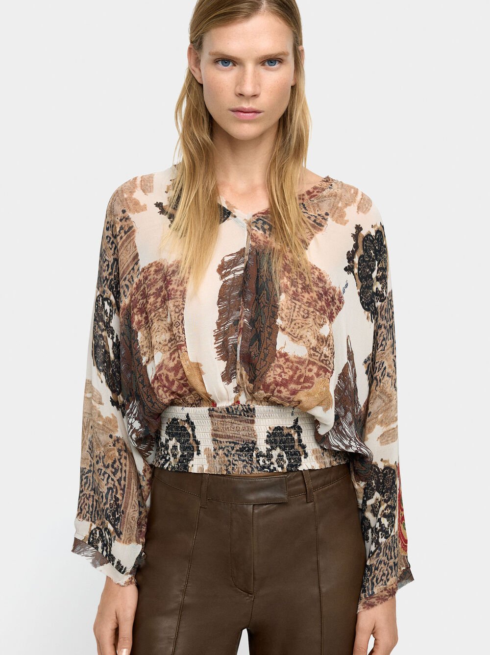Blouse with semi-transparent print