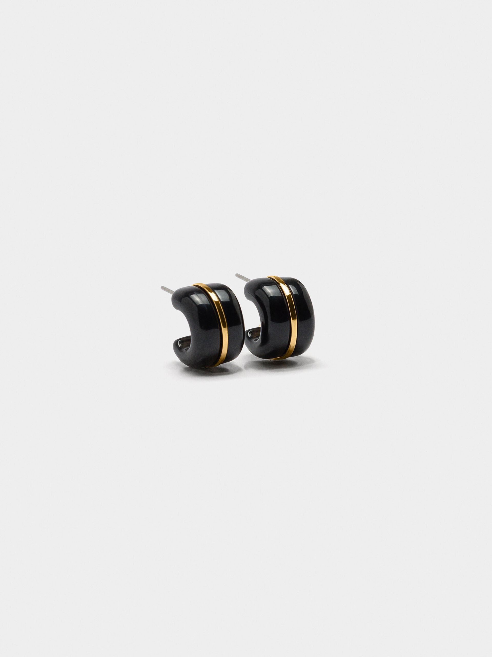 Open hoop earrings in resin image number 0.0