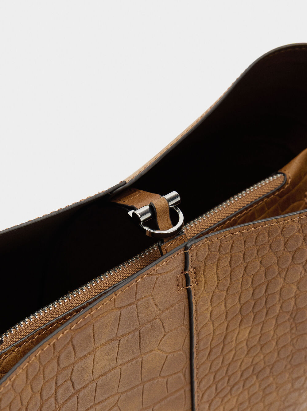 Shoulder bag with animal embossing