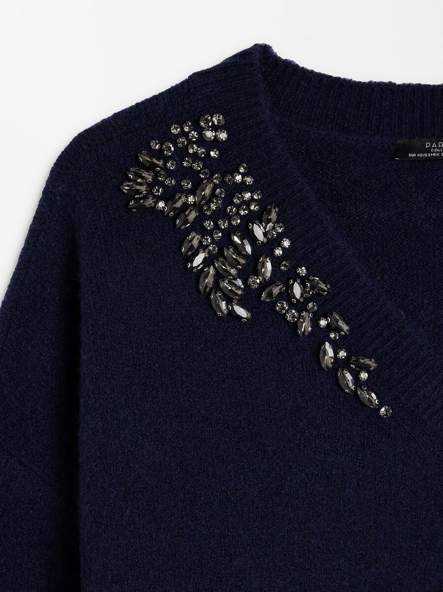 Sweater with wool blend and applications