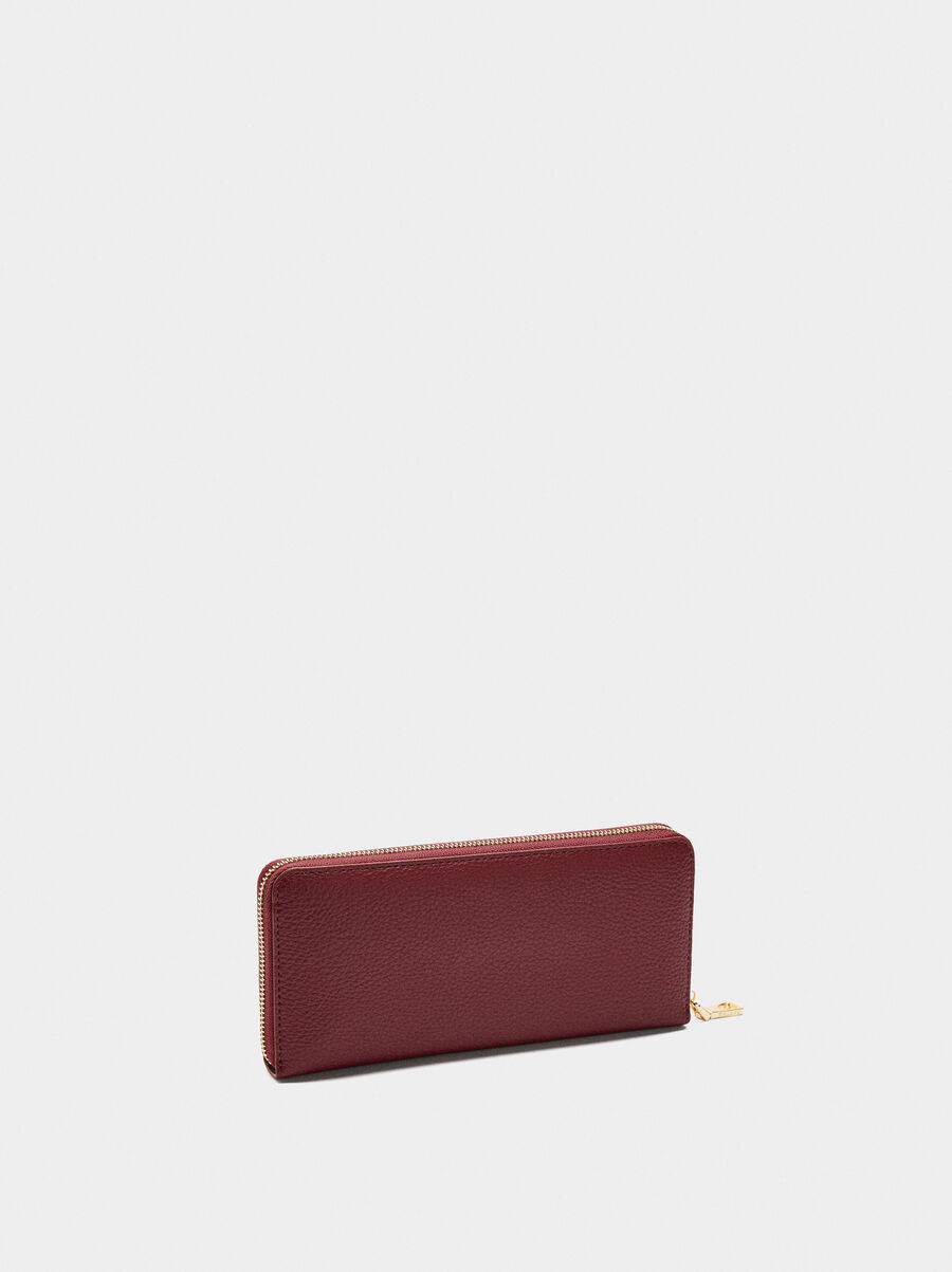 Wallet with texture and zipper closure
