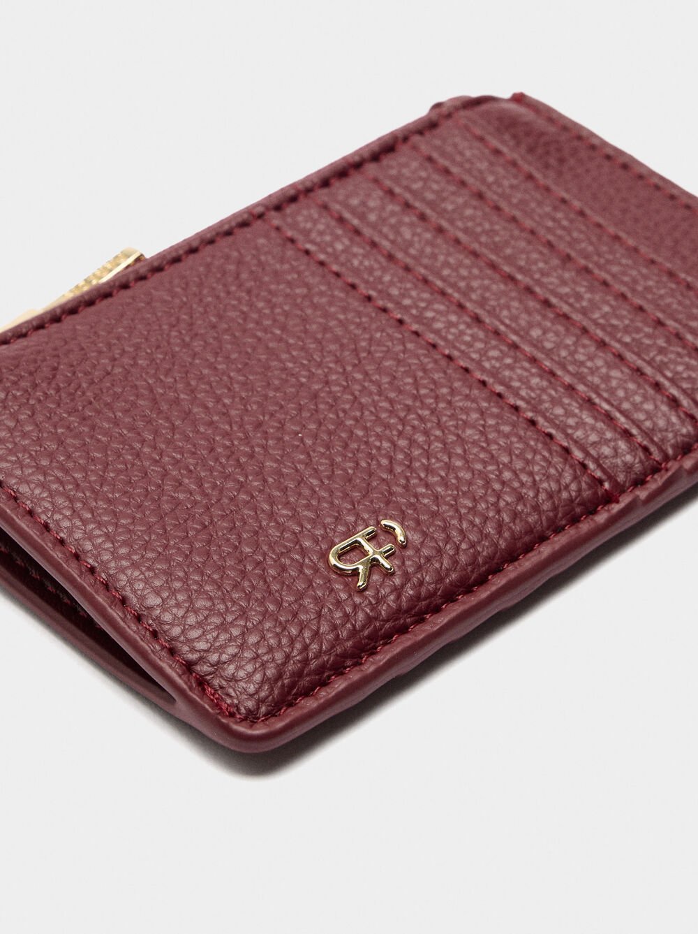 Card holder with zipper closure