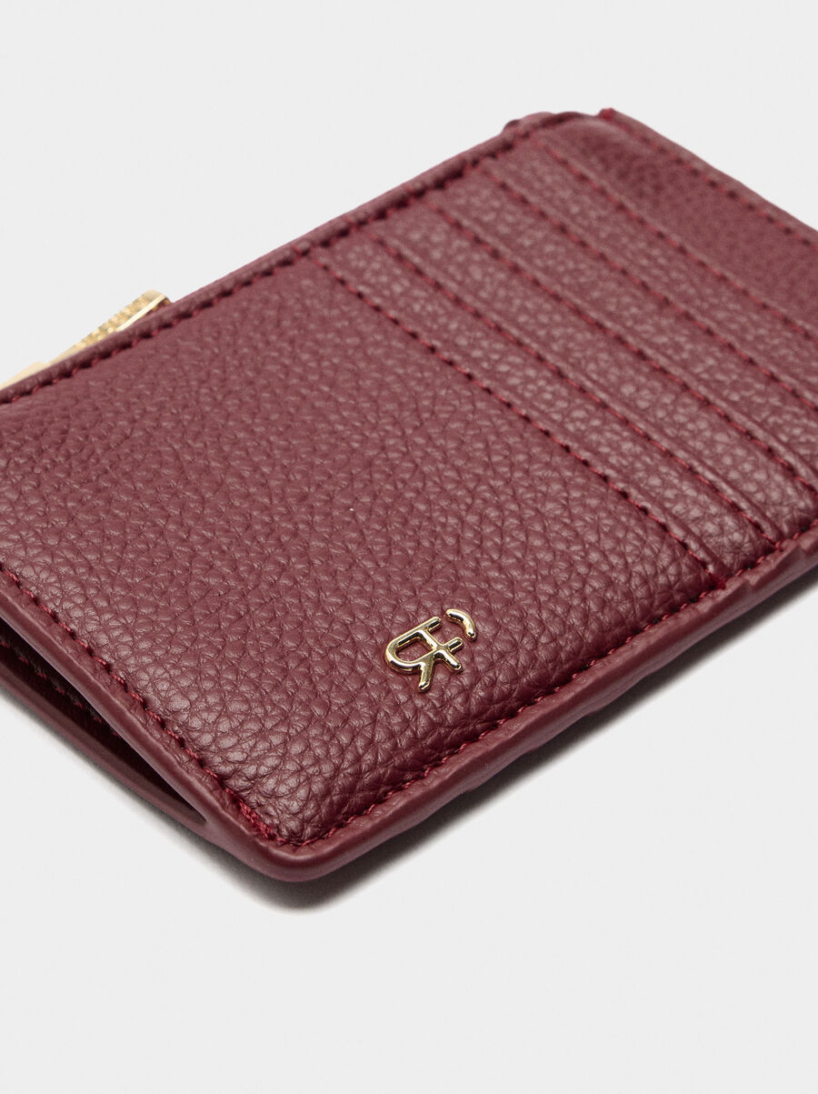 Card holder with zipper closure