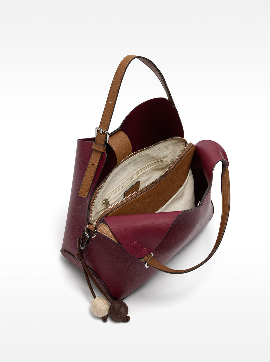 Handbag with strap