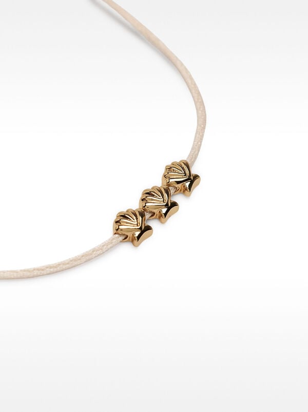 Adjustable shell bracelet