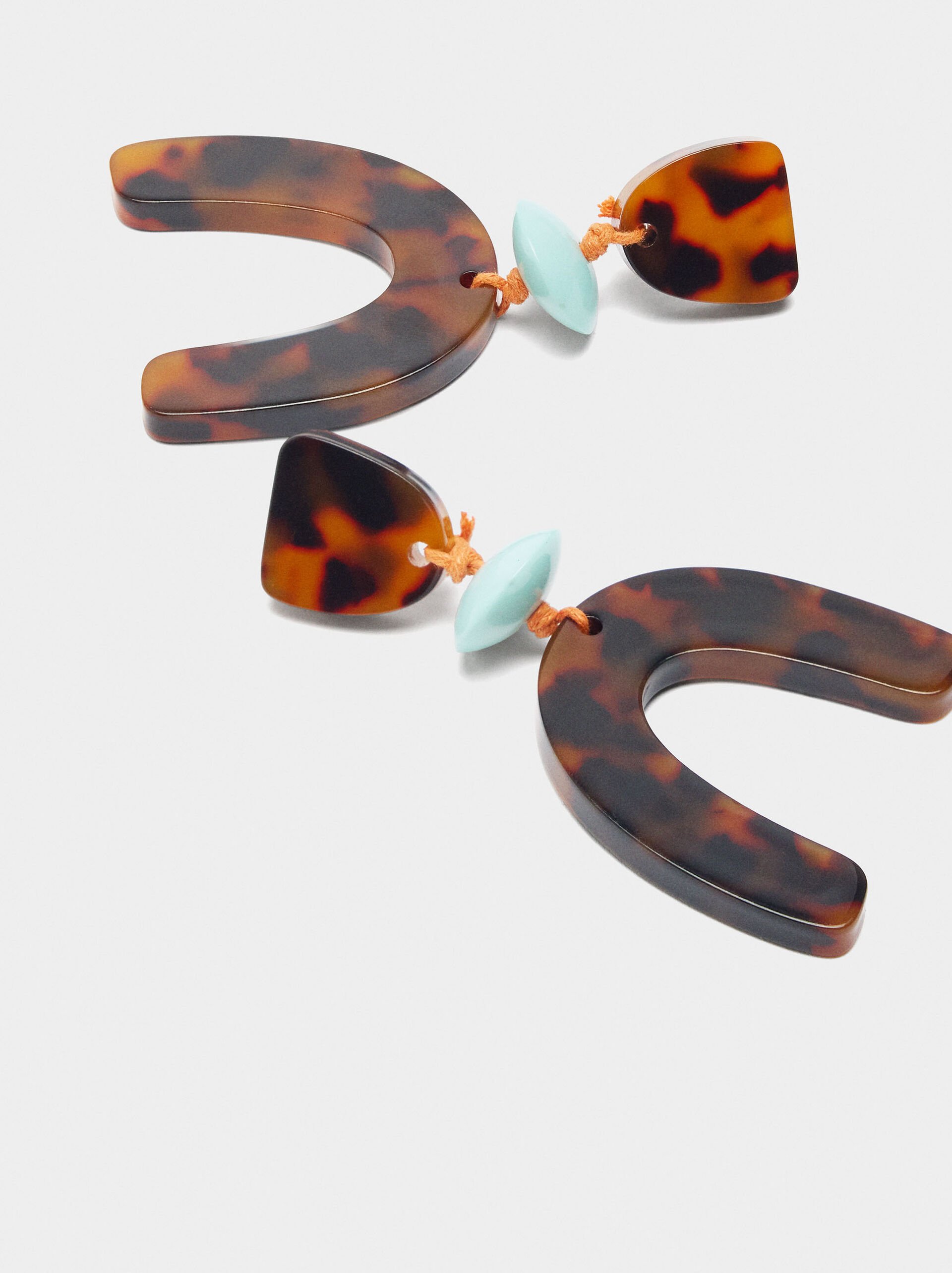 Arch earrings with tortoise effect image number 2.0