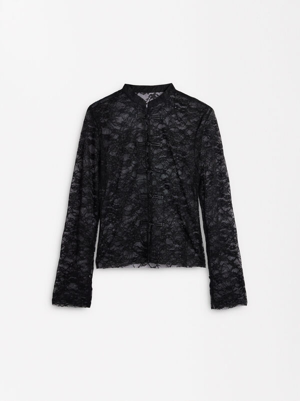 Top a maniche lunghe in pizzo