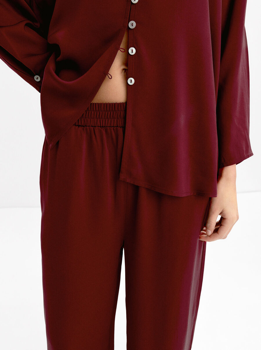 Loose-fitting trousers with elastic waistband