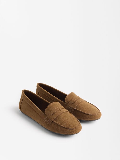 Leather moccasins with stitching