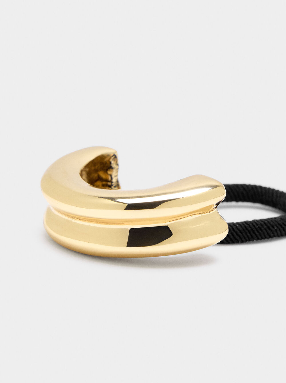 Elastic band for hair with metal arch