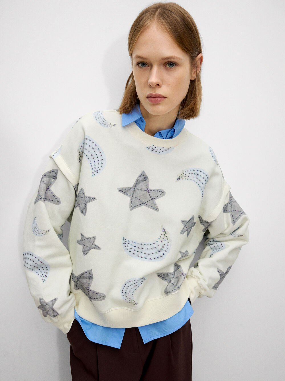 Sudadera de lunas y estrellas