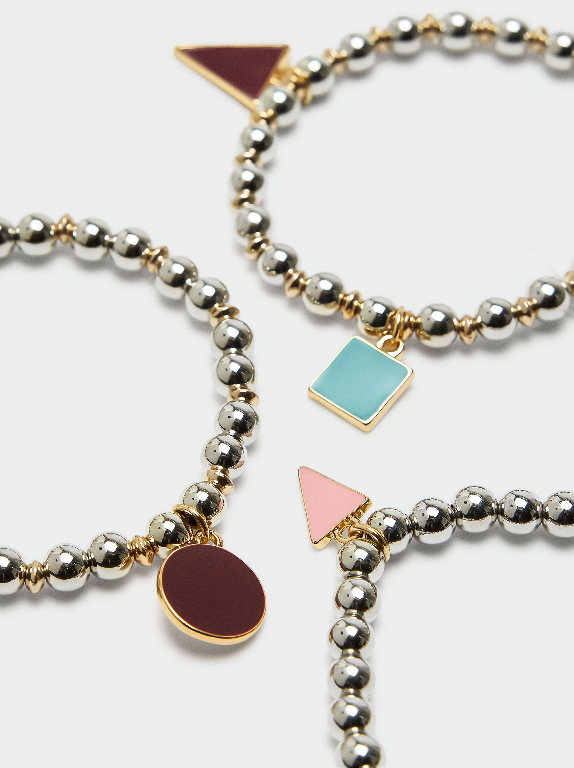 Set of elastic bracelets with charms image number 1.0