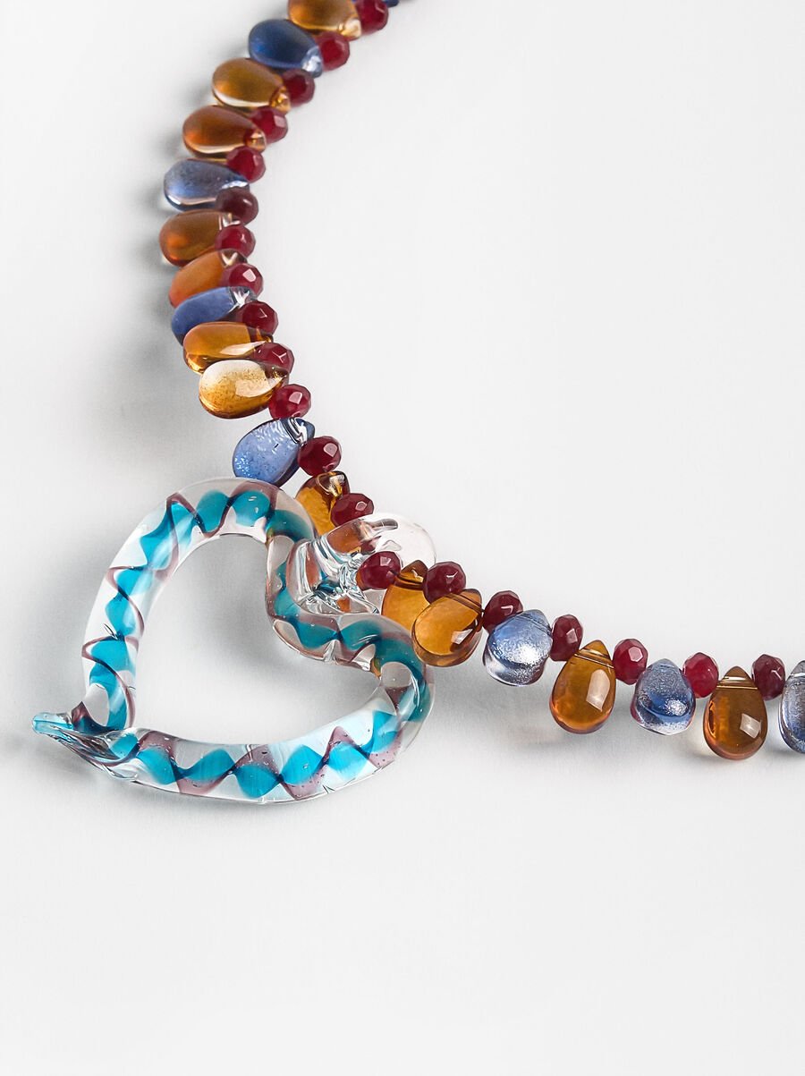 Necklace with bead and heart-shaped glass pendant