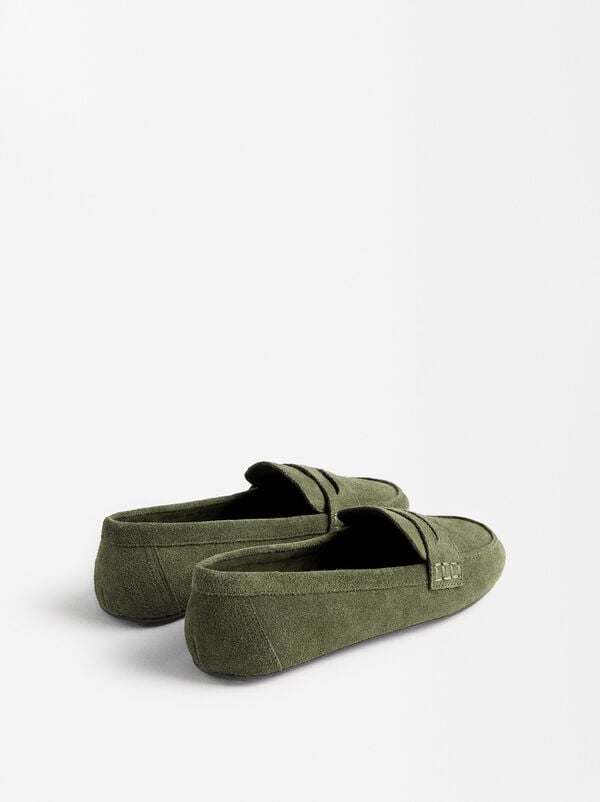 Leather moccasins with stitching