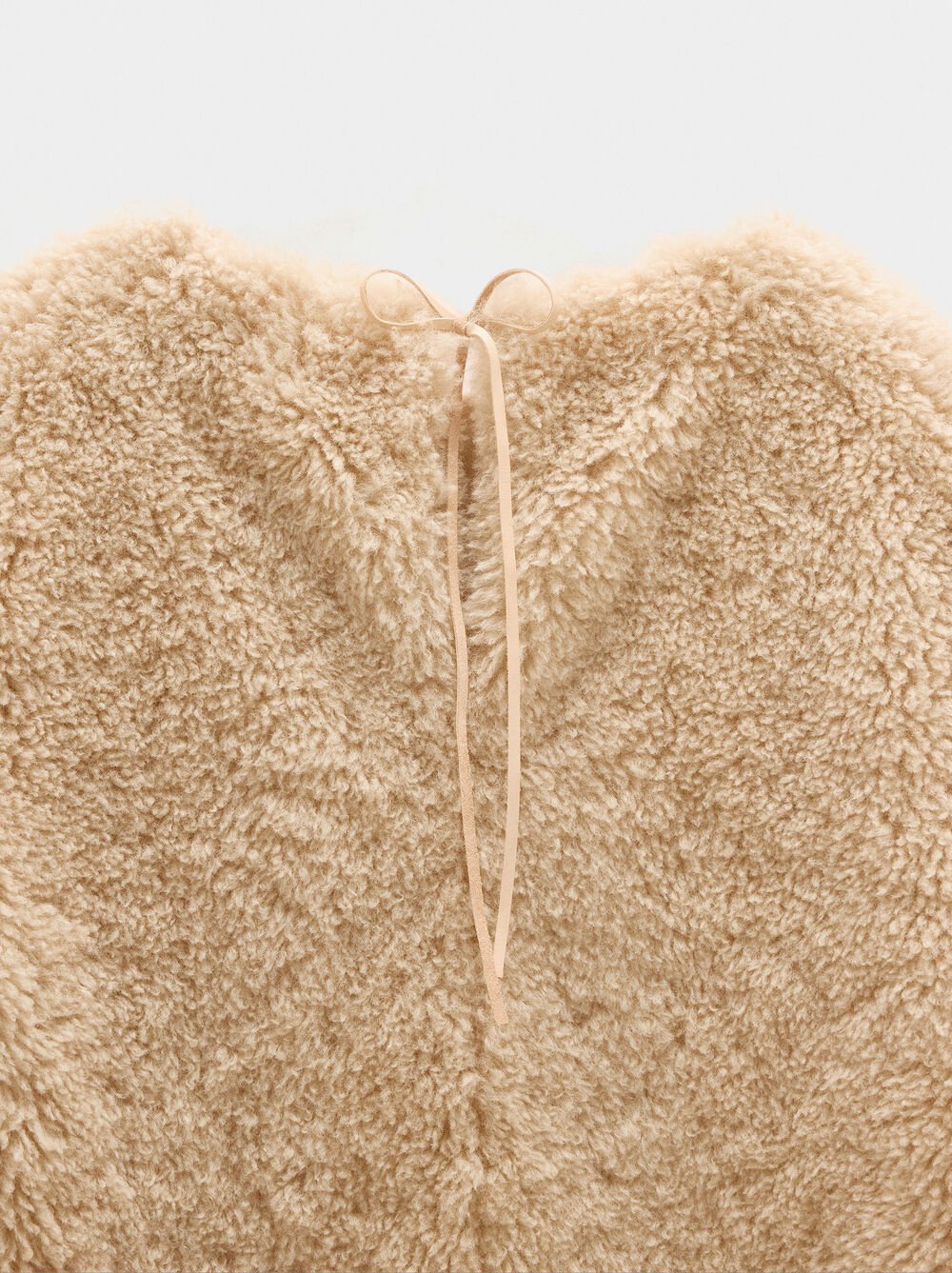 Short dress with leather-effect sheepskin