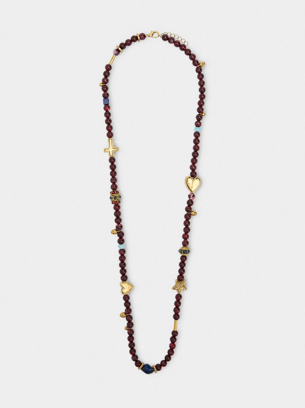 Long necklace of beads with pendants