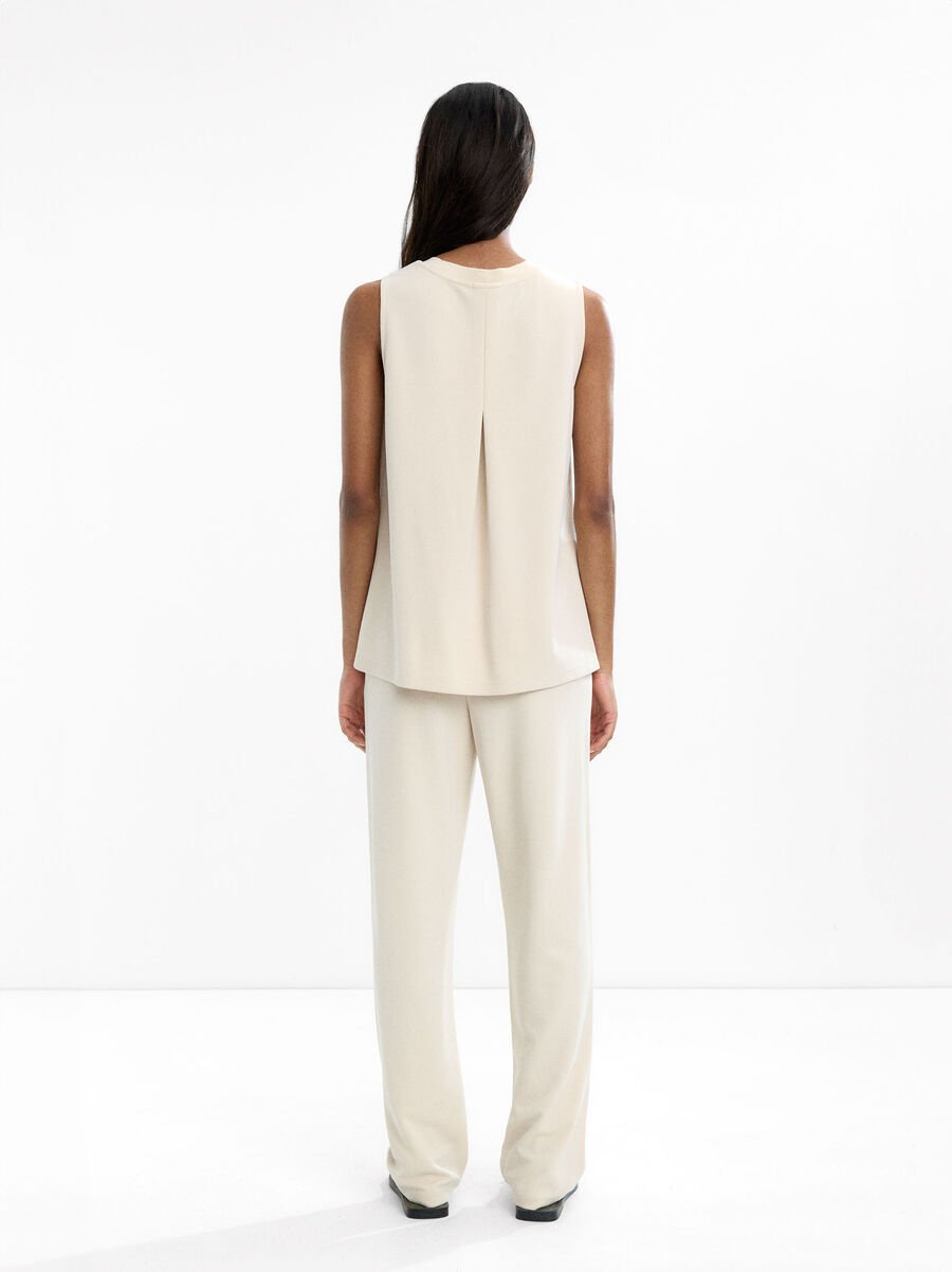 Pleated trousers with elastic waist