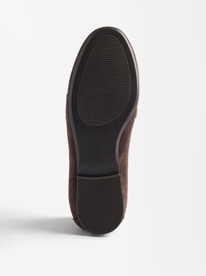 Mocasines de piel con detalle metálico