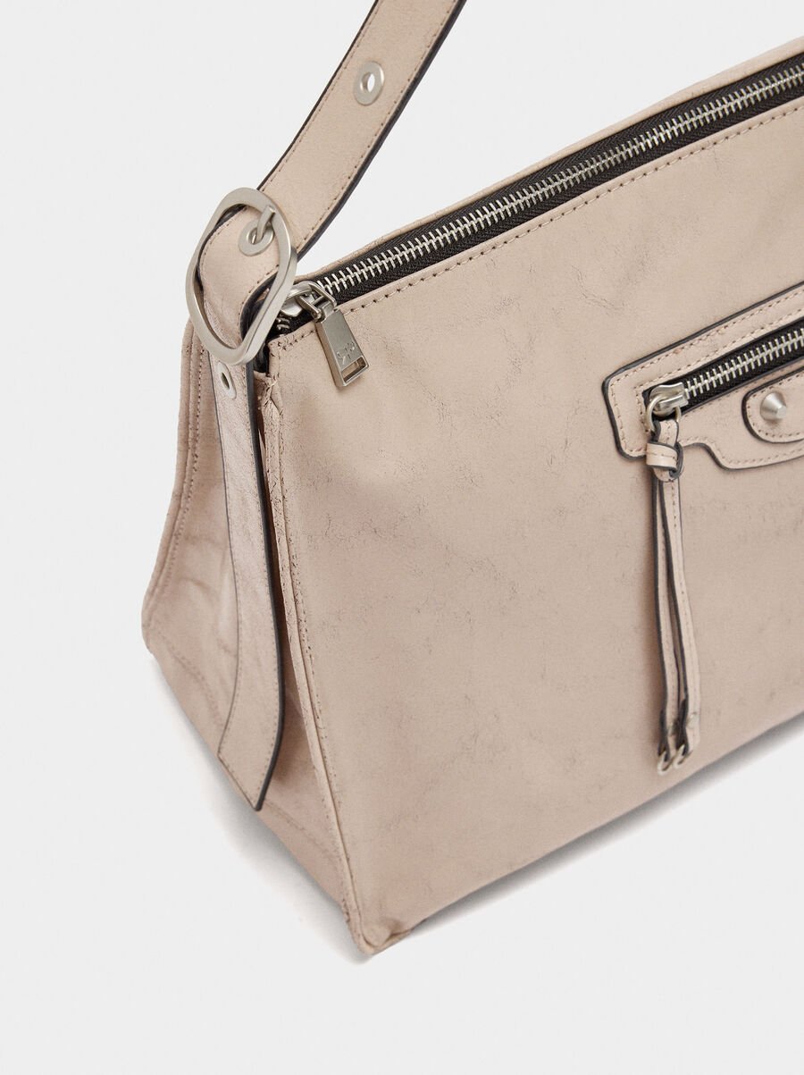 Handbag with aged effect