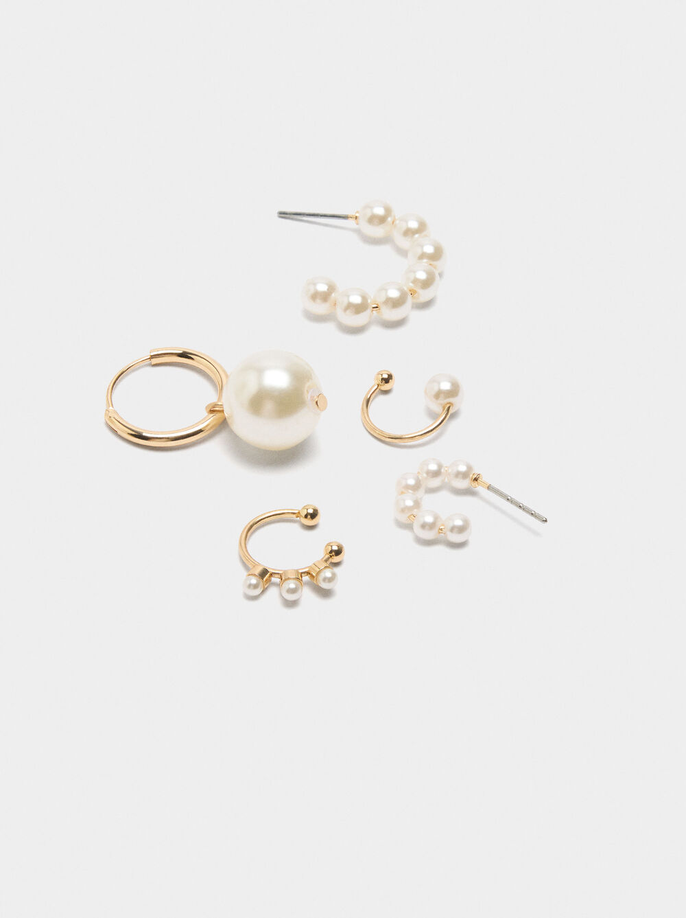 Set of earrings and earjackets with pearls