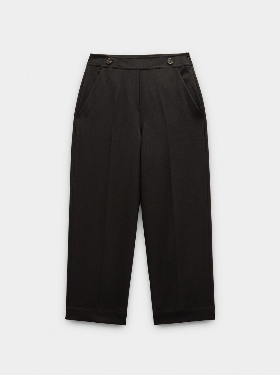 Pantalón fluidos con bolsillos