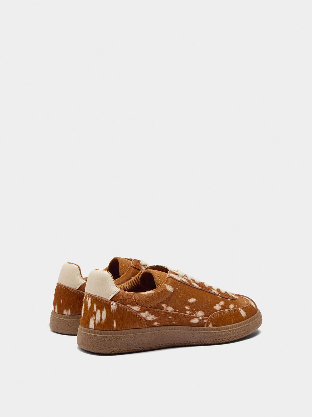 Leather sneakers with animal print