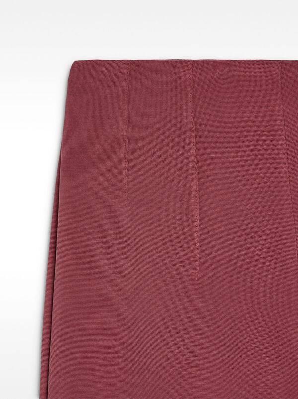 Pleated trousers with elastic waist