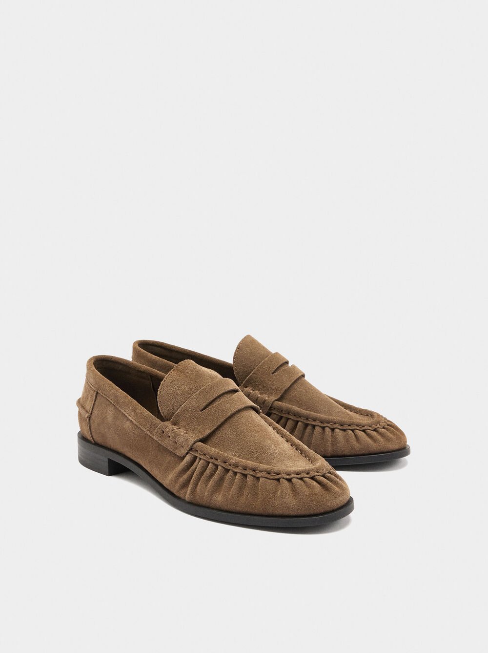 Leather moccasins with stitching
