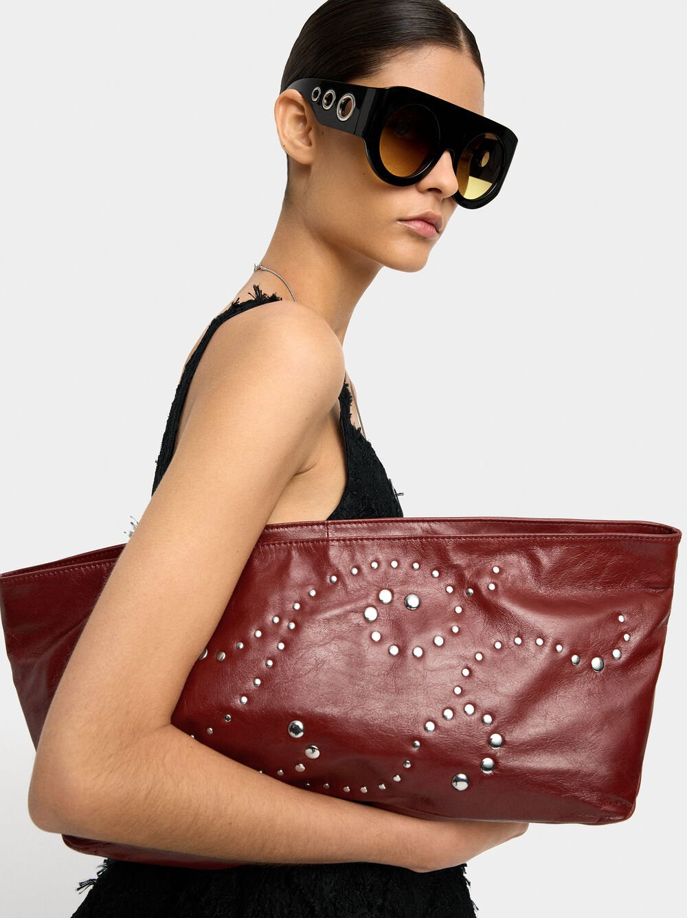 Leather envelope party bag with studs