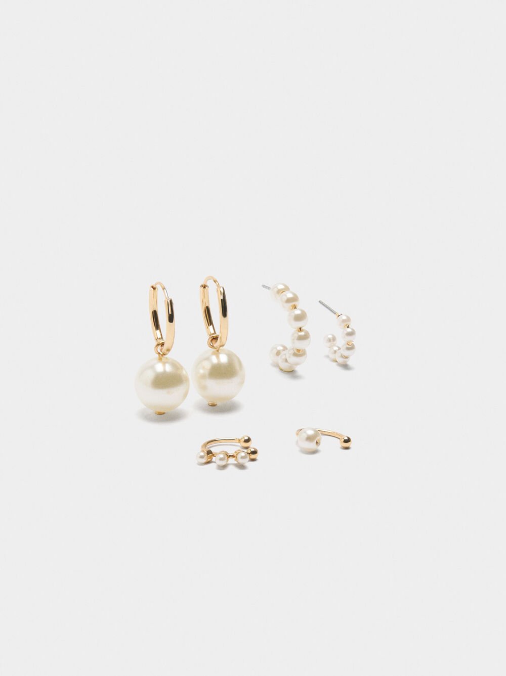 Set de boucles d'oreilles et earjackets en perles