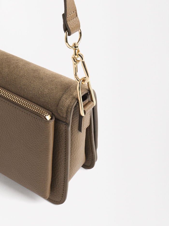 Shoulder bag with fur and flap closure
