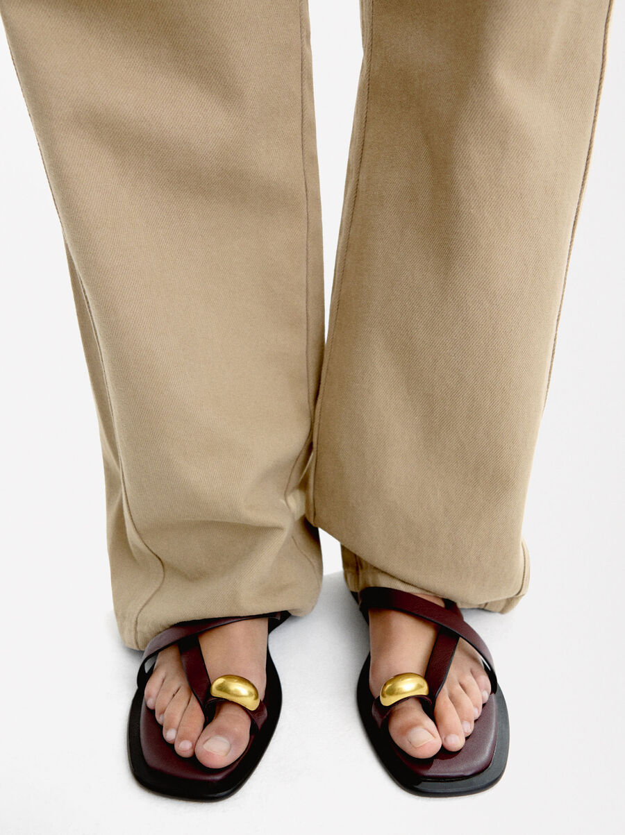 Leather sandals with metallic detail straps