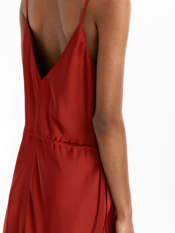 Dress with straps and seams